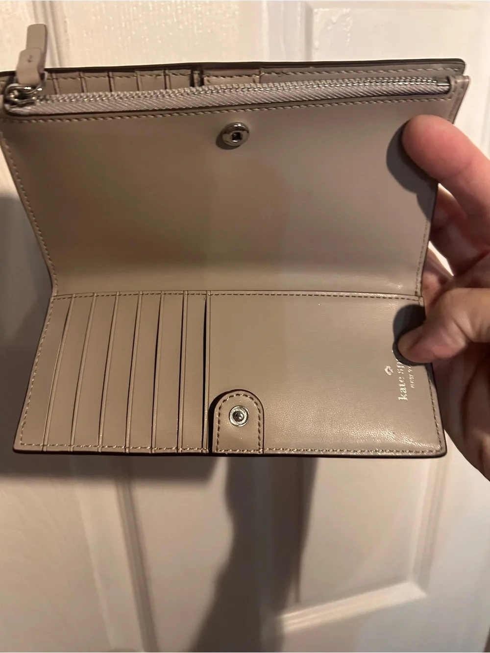 kate spade madison large slim bifold gray leather wallet with gold logo